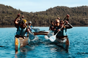 A group on a waka hourua