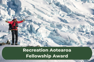 A lady stands on a snowy mountain along with the title 'Recreation Aotearoa Fellowship Award'