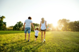 A family walk in a green space