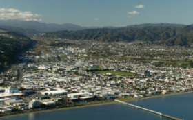 An aerial shot of Hutt City with the harbour in the foreground